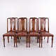 Osted Antik & Design präsentiert: Satz von 8 Esszimmerstühlen aus dunklem Holz und rotem Leder aus den 1920er ...