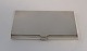 Lundin Antique präsentiert: Sener. Visitenkartenetui aus Silber (900). Länge 9,3 cm. Breite 6 cm.