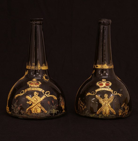 A pair of original decorated bottles. Holland or England circa 1760. H: 22cm