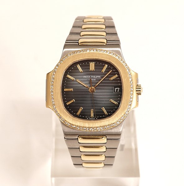 Patek Philippe Nautilus, full set, ref. 3800/002JA. Steel and 18ct Gold. 76 
Diamonds. Bought 04.11.92. D: 37mm