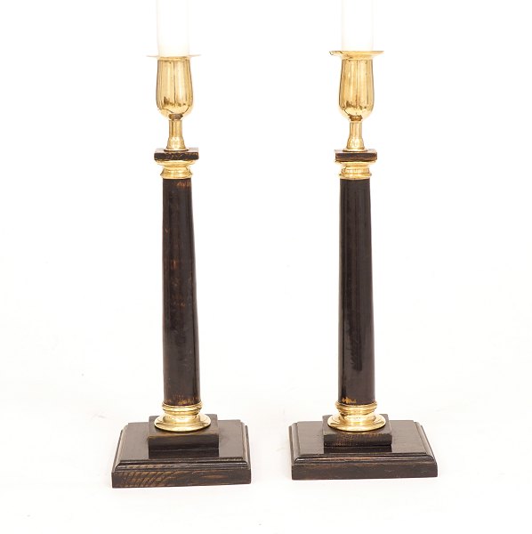 A pair of wood candelsticks with brass mountings. Sweden circa 1840. H: 28,5cm