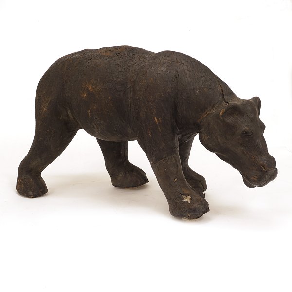 A large leather hippopotamus. In the manner of Dimitri Omersa. H: 35cm. L: 65cm. 
W: 22cm