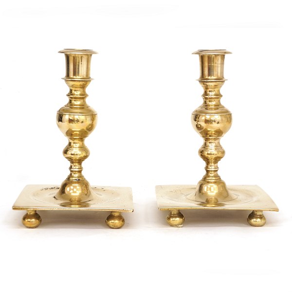 A pair of large brass "castle"-candlesticks. Denmark circa 1740. H: 23cm