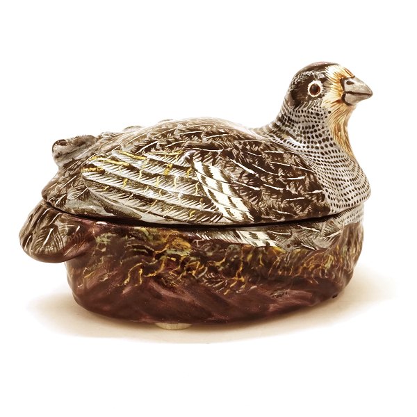 Polychrome Rococo faience tureen in the shape of a partridge. Signed, Marieberg, 
Sweden, circa 1770. H: 9,5cm. L: 16cm