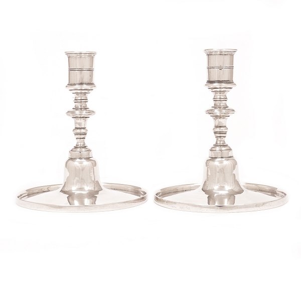 Pair of early Baroque silver candlesticks by Asmus Fridrich Holling, Copenhagen, 
1727-73, dated 1728. H: 12cm. W: 458gr